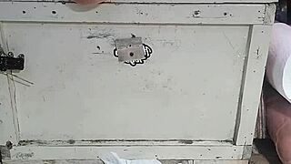 Mature woman stretches with huge dildos