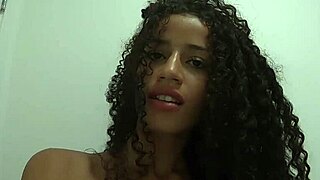 Latina making art in the bathroom