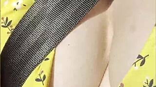 Wifey boldly flashes big tits while driving car