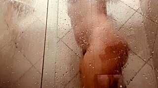 Is that milf washing her hairy pussy?