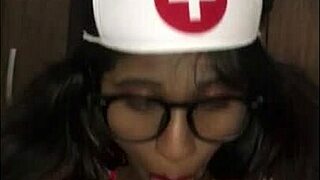 young latina nurse cares for patient in hospital