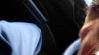 Shemale has rapid oral sex in the car