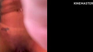 The wife experiences two orgasms while touching herself intimately in a personal moment.