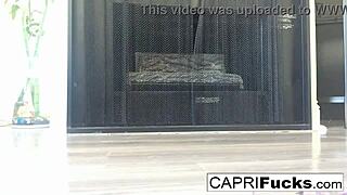 brunette pornstar capri masturbates pussy solo in high heels with big tits exposed