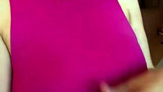 Hey, check out this horny stepmother sucking on her own big milky natural tits in a homemade outdoor scene. She's a total slutty milf getting off like that in public.