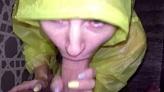 horny girlfriend giving blowjob with raincoat in shower ending with cumshot on face