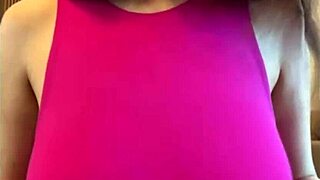 Hey, check out this horny stepmother sucking on her own big milky natural tits in a homemade outdoor scene. She's a total slutty milf getting off like that in public.