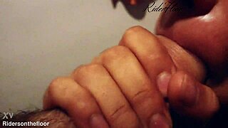 Beautiful lips tease and suck in close up.