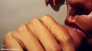 Beautiful lips tease and suck in close up.