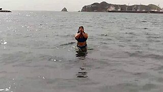 Whoa, check this curvy Latina gordita with a massive big ass shaking it on the beach, all homemade and tattooed! 🍑🏖️🔥