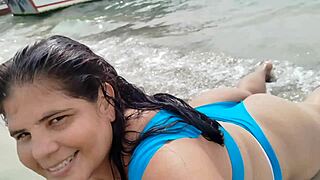 Whoa, check this curvy Latina gordita with a massive big ass shaking it on the beach, all homemade and tattooed! 🍑🏖️🔥