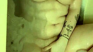 hey, check out this tomboy doing a sexy striptease then hitting wild bathtub orgasms 💦🛁