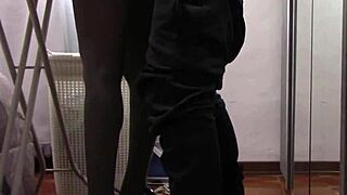 The milf with beautiful legs in pantyhose irons clothes. She gets touched gently before intimate moments.