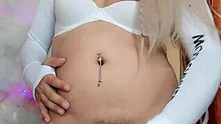 hermosa transexual blanca nieves shows off her crossdressing style in a casual everyday setting.