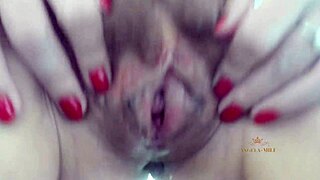 sexy milf angela jerks off hairy pussy close-up on camera and moans while cumming on young husbands face with juice for him to lick