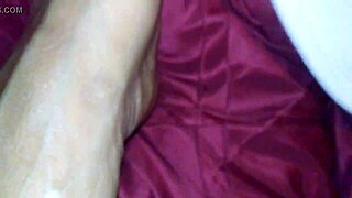 the ebony foot job unfolds with black cumshot and feet action in ebony elegance style.
