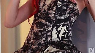 Redhead Elle Alexandra teases with a slow striptease for Playboy. Yet her undressing reveals more than expected in solo action