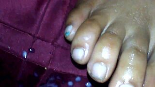 the ebony foot job unfolds with black cumshot and feet action in ebony elegance style.