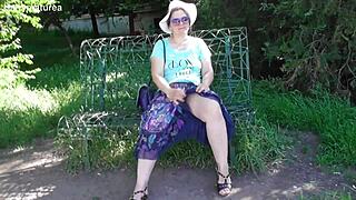 This chubby mature woman walks outdoors in a see-through dress flashing her hairy pussy under the skirt.