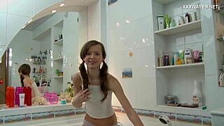 Dasha's petite brunette body contrasts with her intense shower masturbation session leading to orgasm.