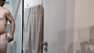 pornstar brasil shows off that brazilian bear's huge cock in a steamy shower