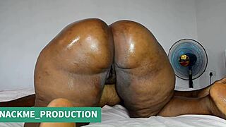 Picture my curvy bbw wife all oiled up riding a big black monster cock while I watch her fat ass bounce