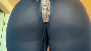 The PAWG stretches her ripped pants, revealing big ass and tits in a teasing display.