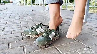Tan Nylon Soles With Blue Jeans Teasing On The Bench Outdoors