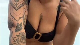 young african girl on usa beach wears tight yellow bikini to show swollen pussy and draw attention