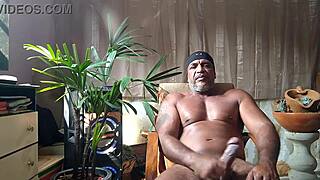brazilian bear kojac strokes his huge hairy cock solo with armpit fetish tease