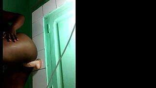 Black Gymnast Fixes Dildo on Wall for Athletic Fucking