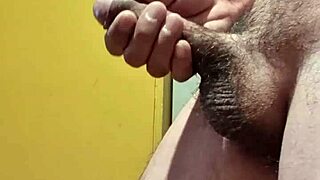 The slim mature guy strokes his cock in a steamy bisexual jerk session.