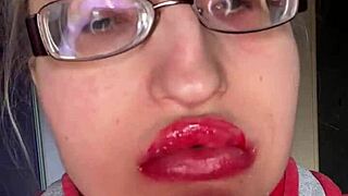 giantess with huge lips n glasses smears snickers bar... mmm so messy!