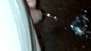 She sneaks out to pee on the quiet street at night