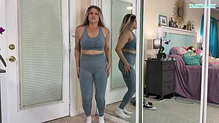 Sexy milf tries on tight gym clothes flashing her huge natural tits everywhere