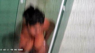 hidden cam catches busty neighbor milf shaving smooth