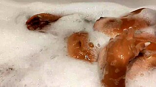 Tanned Stepsister Plays with Big Tits and Wet Pussy in Bathroom