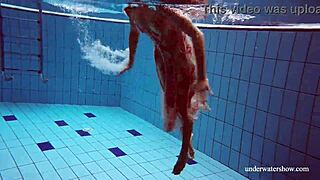 Martina's big tits swim underwater in shower