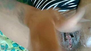 Ebony Babe Fingers Her Pussy