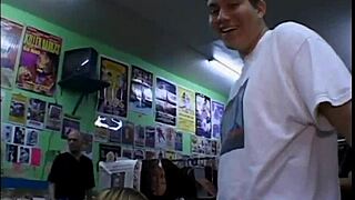 Why is the hot blonde licking her pussy and giving blowjobs to a group of men?