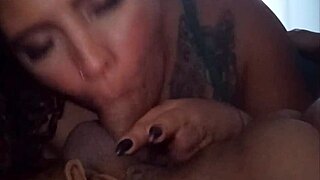 feeling aroused as the tattooed brunette prostitute keeps giving blowjobs to her cock in this couple scene