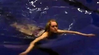 Blonde girl in sexy bikini enjoys a hassle-free night