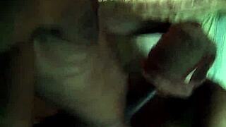 A couple having sex in the dark