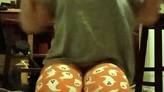 sweaty grey tee clinging during intense workout session