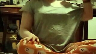 sweaty grey tee clinging during intense workout session