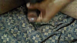 Indian gay guy strokes cock while watching porn videos