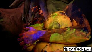 Busty Natasha Nice Is Shooting A Fun And Sexy Black Light Video, Teasing Her Big Tits.