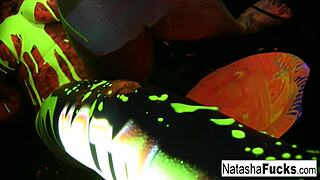 Busty Natasha Nice Is Shooting A Fun And Sexy Black Light Video, Teasing Her Big Tits.