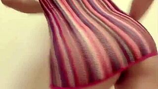 Sexy Asian milf dances without panties, revealing hairy pussy.