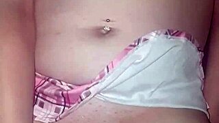 She used her vibrator while wearing sexy lingerie, reaching orgasm.